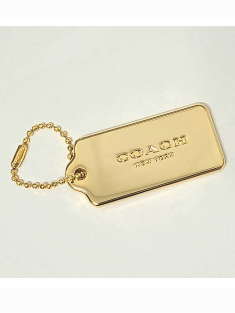 COACH New York Large Gold-Tone Heavy Metal Hang Tag Bag Charm & Branded Chain